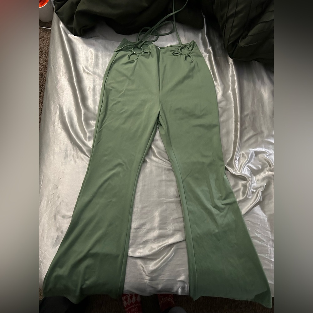 Green cutout flared pants